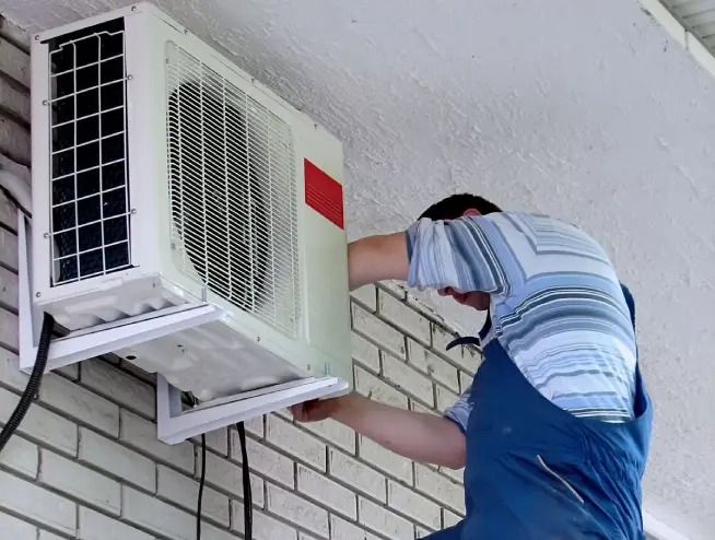 Cassette air conditioner installed in commercial ceiling