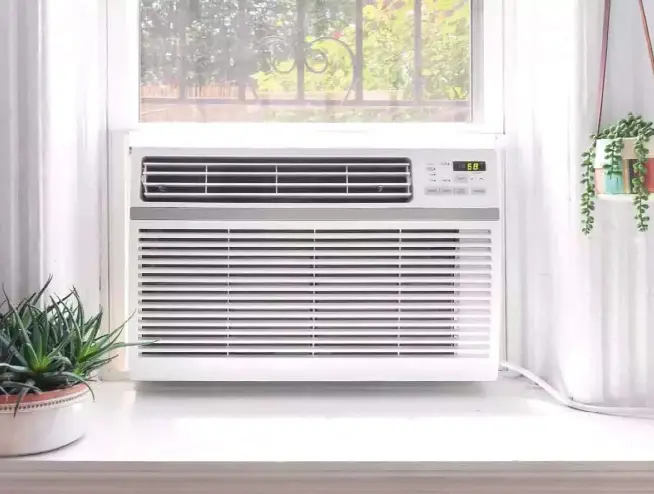 Window air conditioner unit installed in residential room